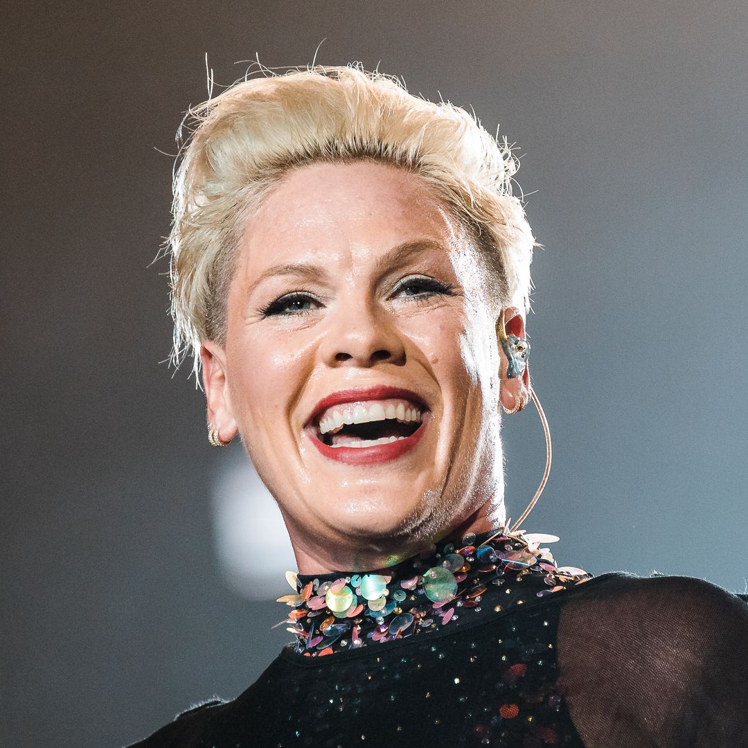 Pink almost unrecognizable with long blonde locks in unearthed photo