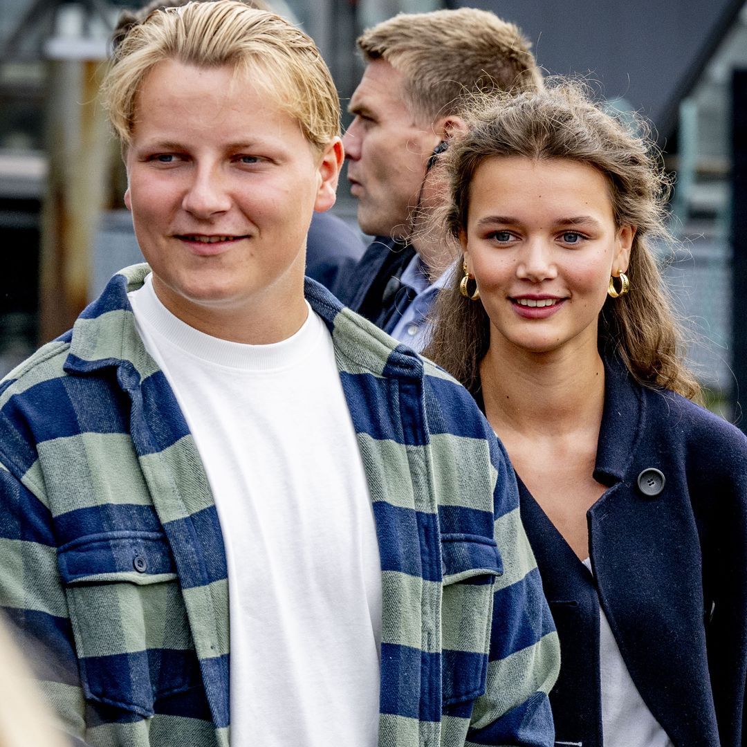 Crown Princess Mette-Marit's son Prince Sverre pictured hand-in-hand with reported girlfriend at Norwegian wedding