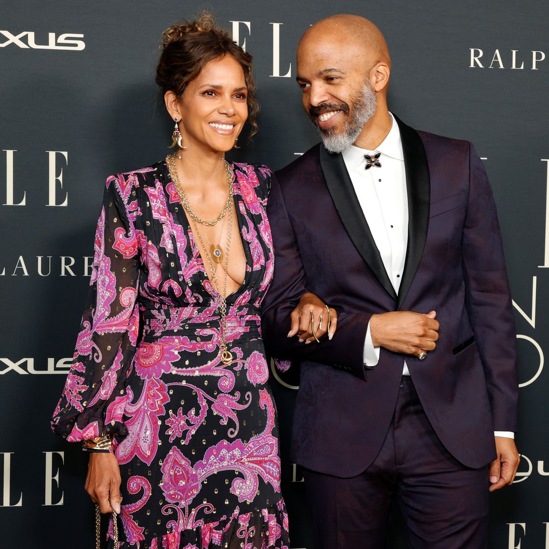 Halle Berry rocks plunging dress with high slits for rare appearance with boyfriend Van Hunt