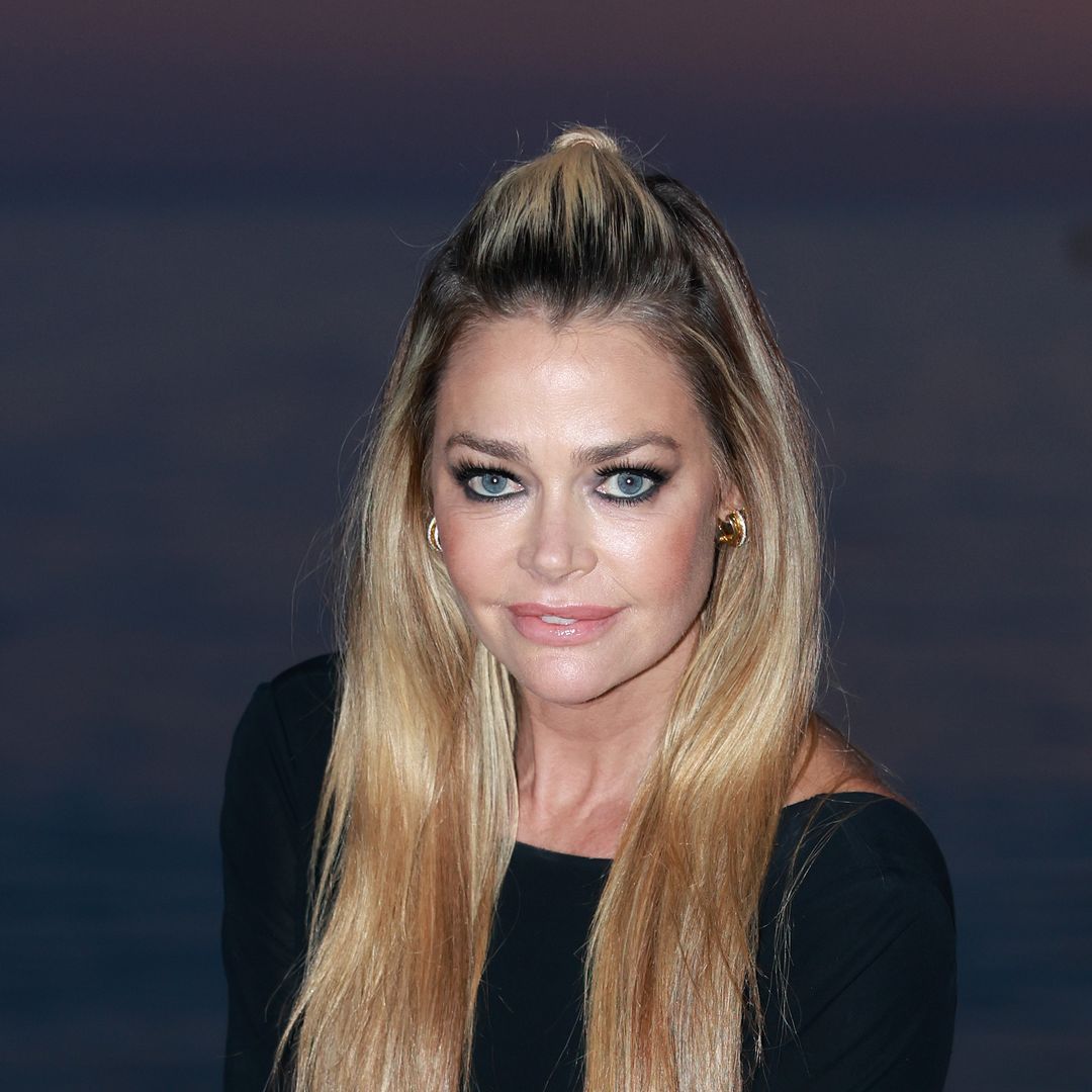 Denise Richards wows in figure-hugging blue swimsuit in latest poolside photo