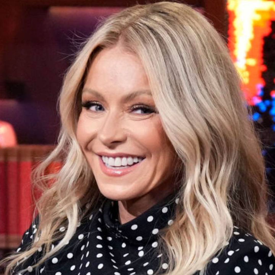 Kelly Ripa is unrecognizable dressed as Ryan Seacrest for a Halloween costume gone by