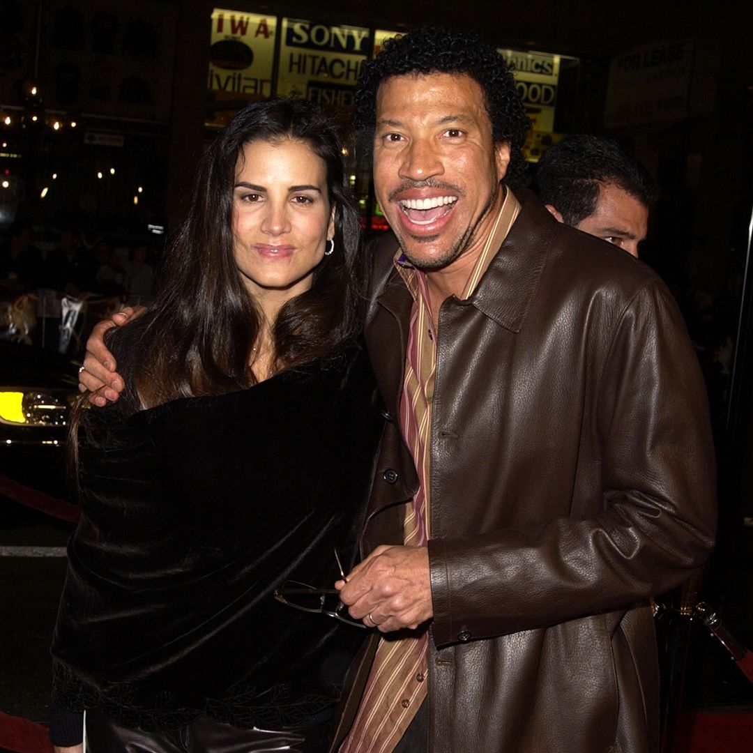 Lionel Richie and Diane smiling at an event