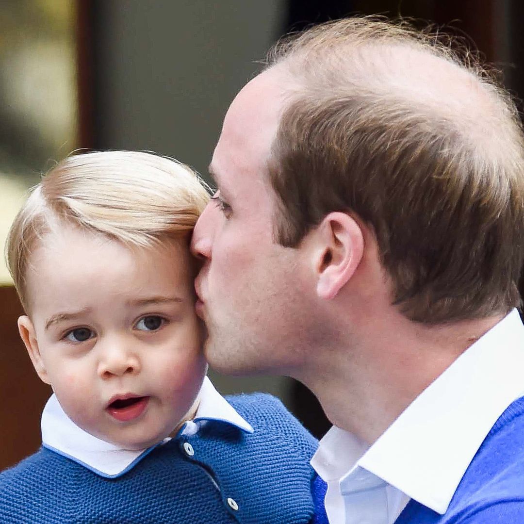 9 sweet photos of royal dads kissing their children