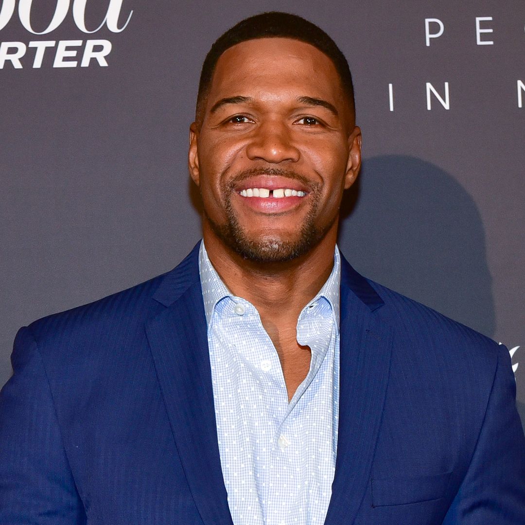 Michael Strahan's girlfriend looks tiny as she poses with GMA host and his striking daughter