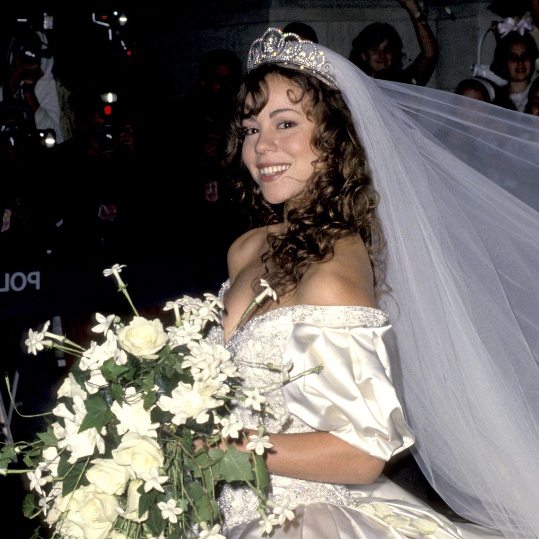 Mariah Carey's Princess Diana-inspired wedding dress was dramatically different to her second gown – see photos
