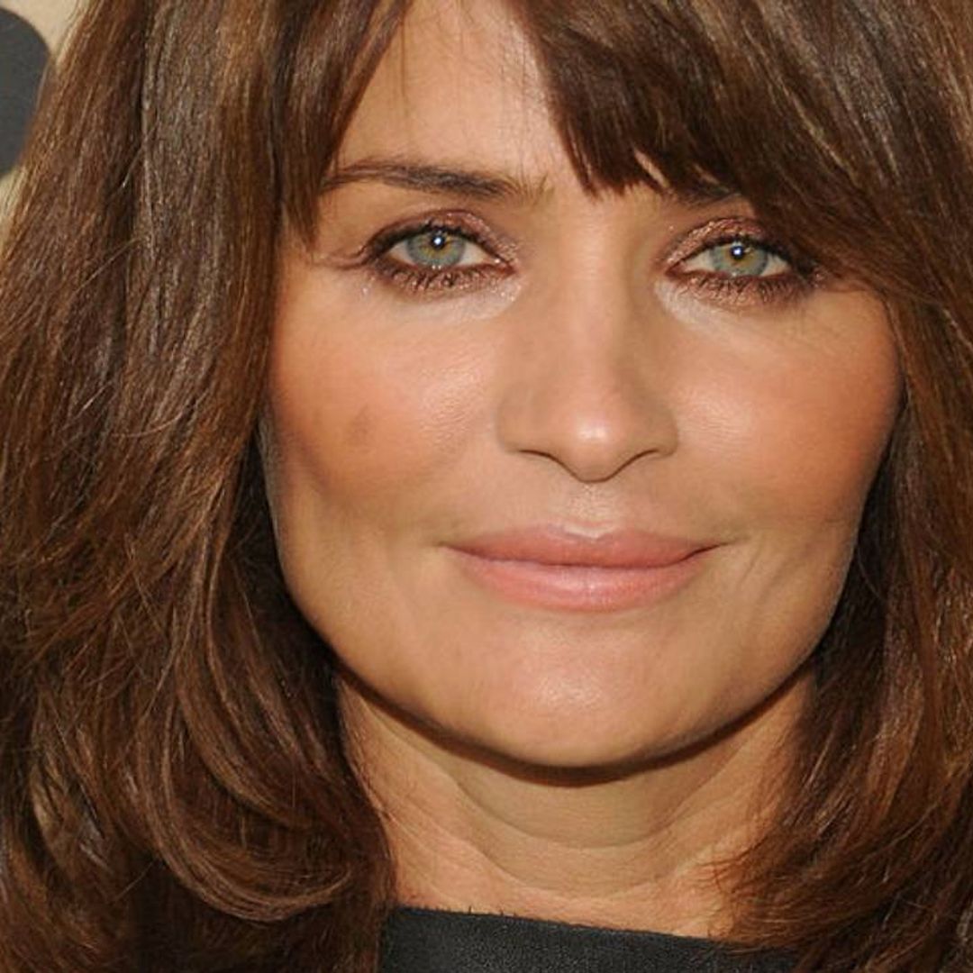 Helena Christensen's body is unbelievable in multi-coloured swimsuit during tropical vacation