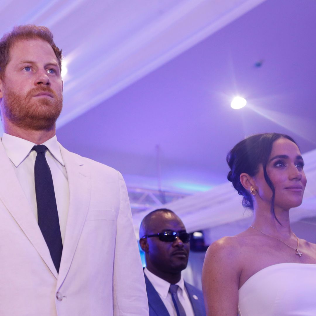 Prince Harry and Meghan Markle's reaction revealed as God Save the King is sung - watch