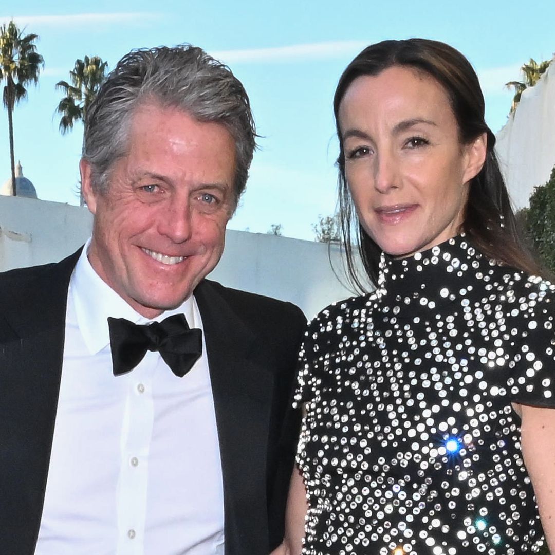 Hugh Grant, 64, puts on a brave face with wife Anna Eberstein, 41, after huge snub