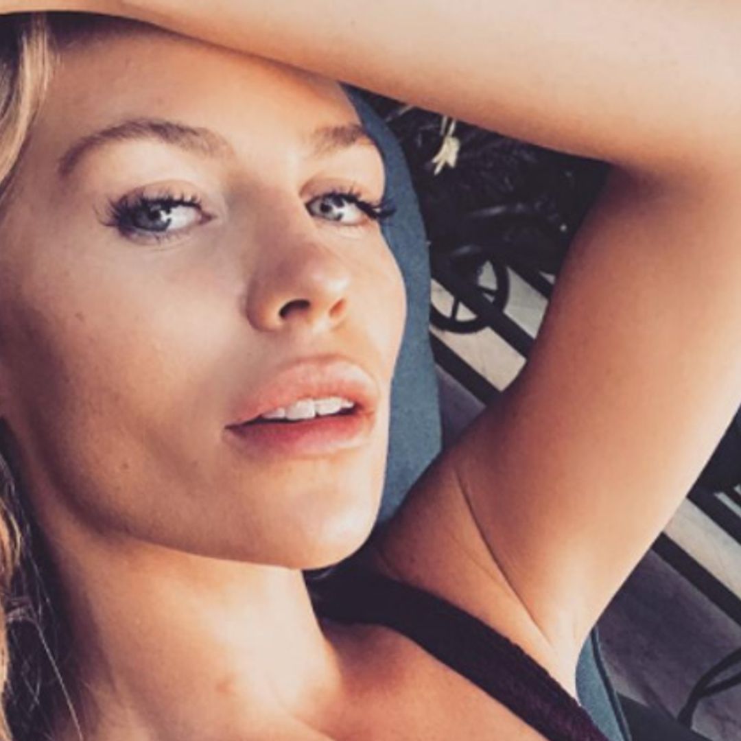 Abbey Clancy sizzles in just a robe in lavish bathroom
