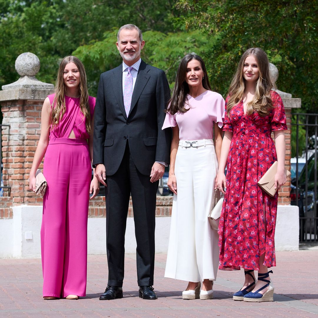 Queen Letizia coordinates in pink with family at Infanta Sofia's confirmation