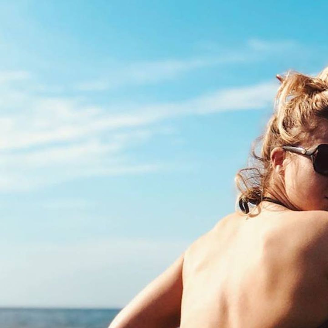 Gemma Atkinson stuns fans with topless sunbathing photo