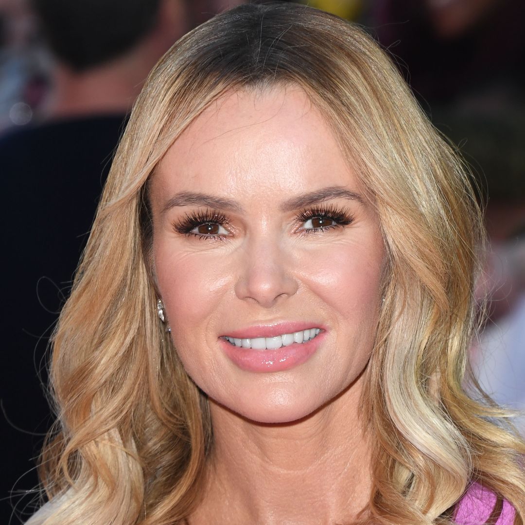 Amanda Holden wows in fitted leopard mini dress and sky-high platforms
