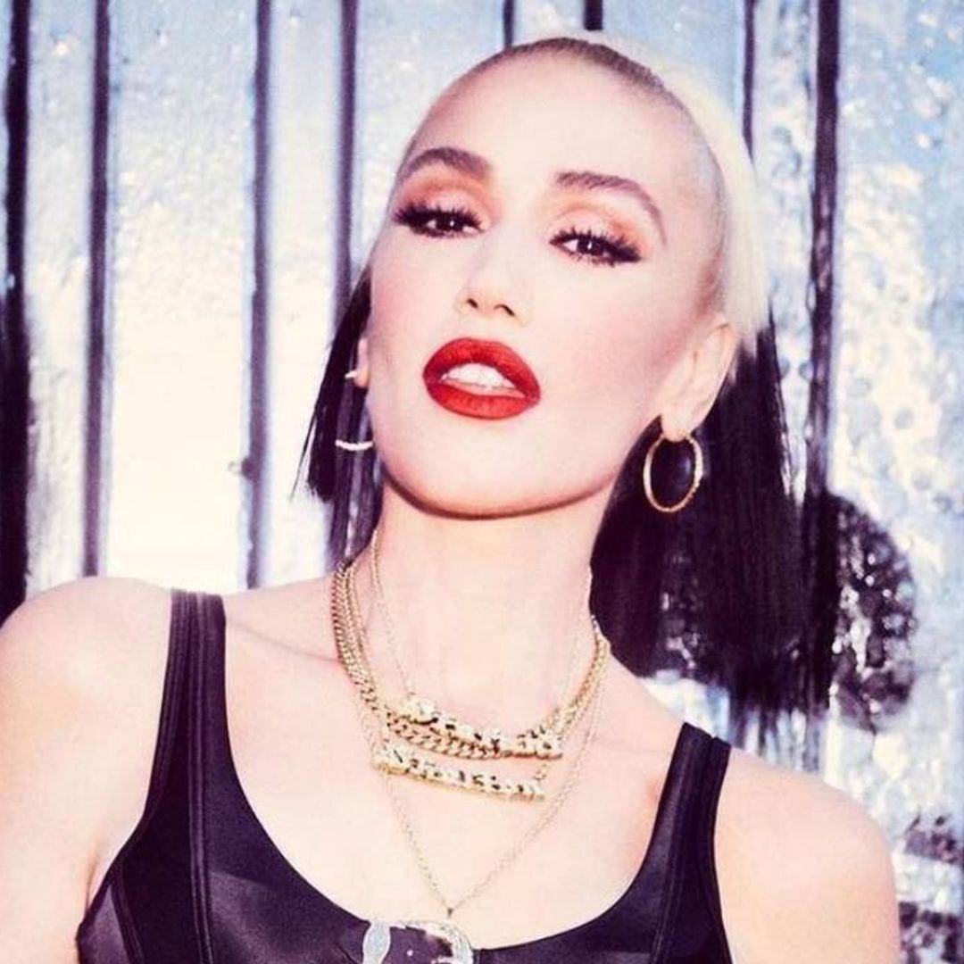 Gwen Stefani looks so youthful in patent leather bra and fishnets