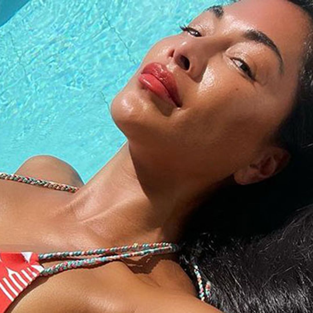 Nicole Scherzinger shows off her athletic prowess in tropical-print bikini