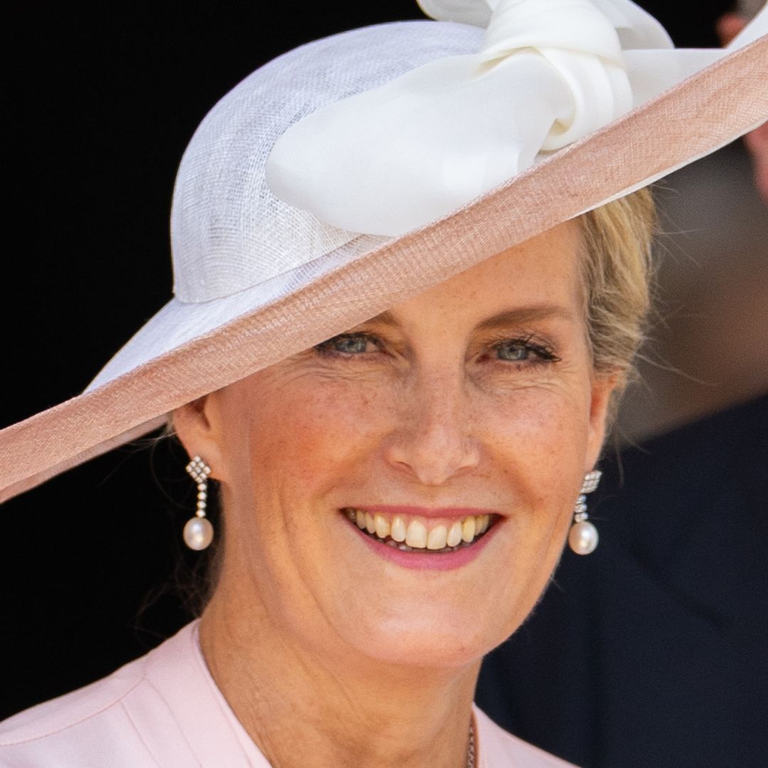 Duchess Sophie is resplendent in hot pink swishy pleated dress