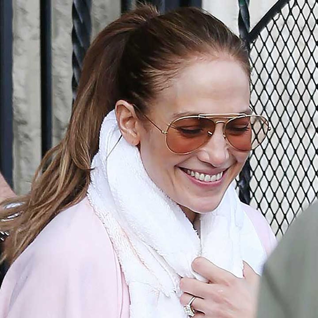 Jennifer Lopez flashes abs in chic cropped sweater – and you HAVE to see her new designer bag
