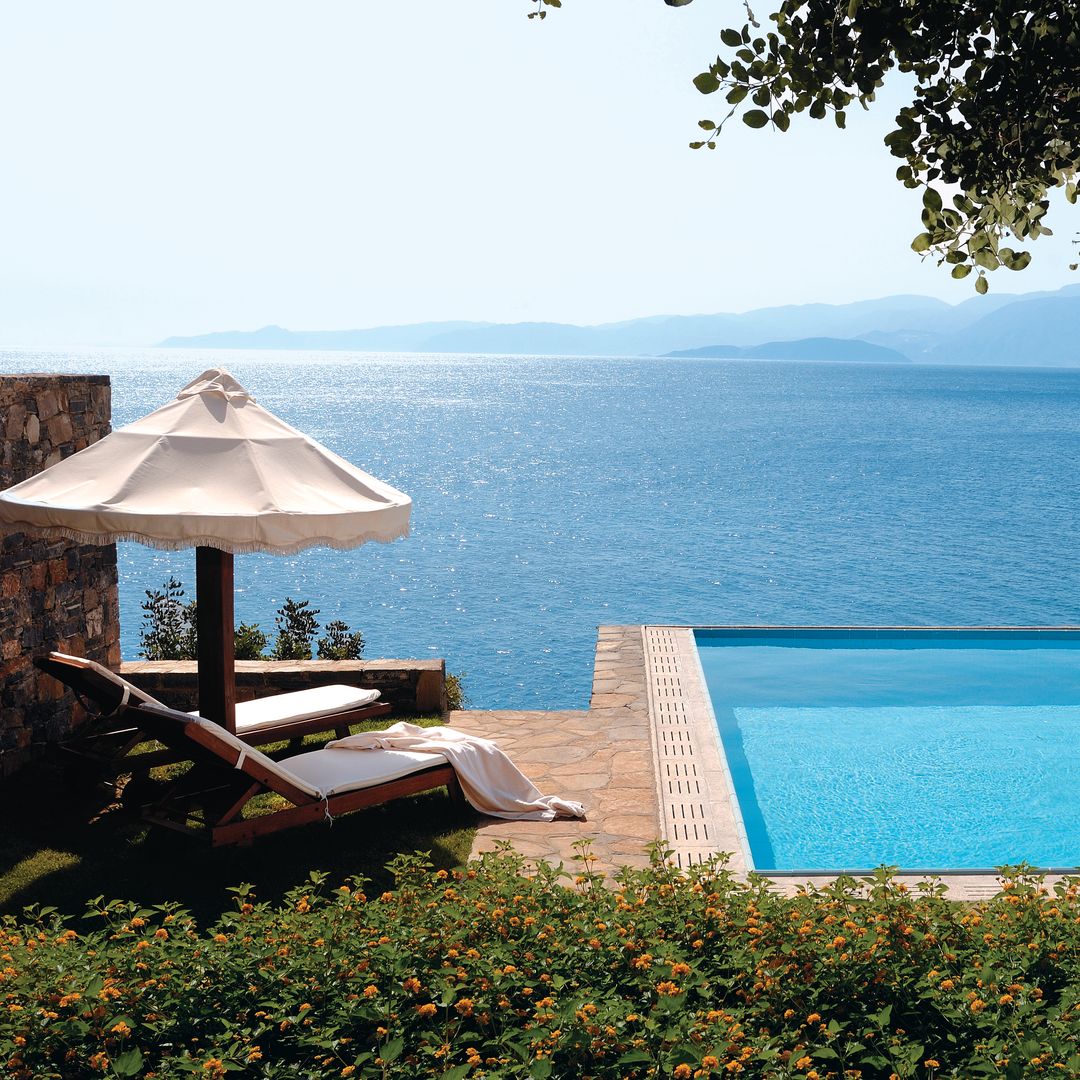 ELOUNDA PENINSULA, CRETE pool terrace and view of ocean