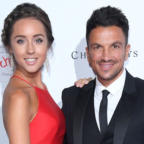 Emily Andre wows in red siren dress & glam flats as she shares photo of her growing baby bump on NYE
