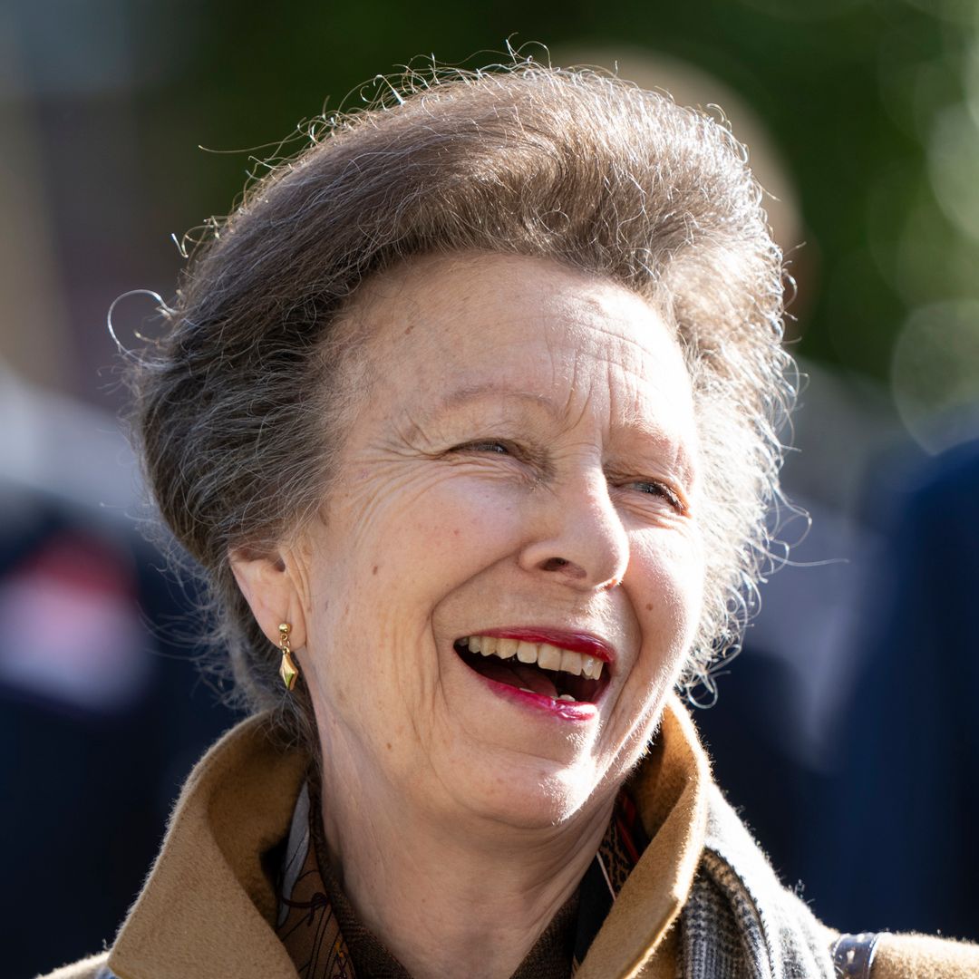 Princess Anne delights in suede boots and luxe scarf alongside husband Sir Timothy Laurence