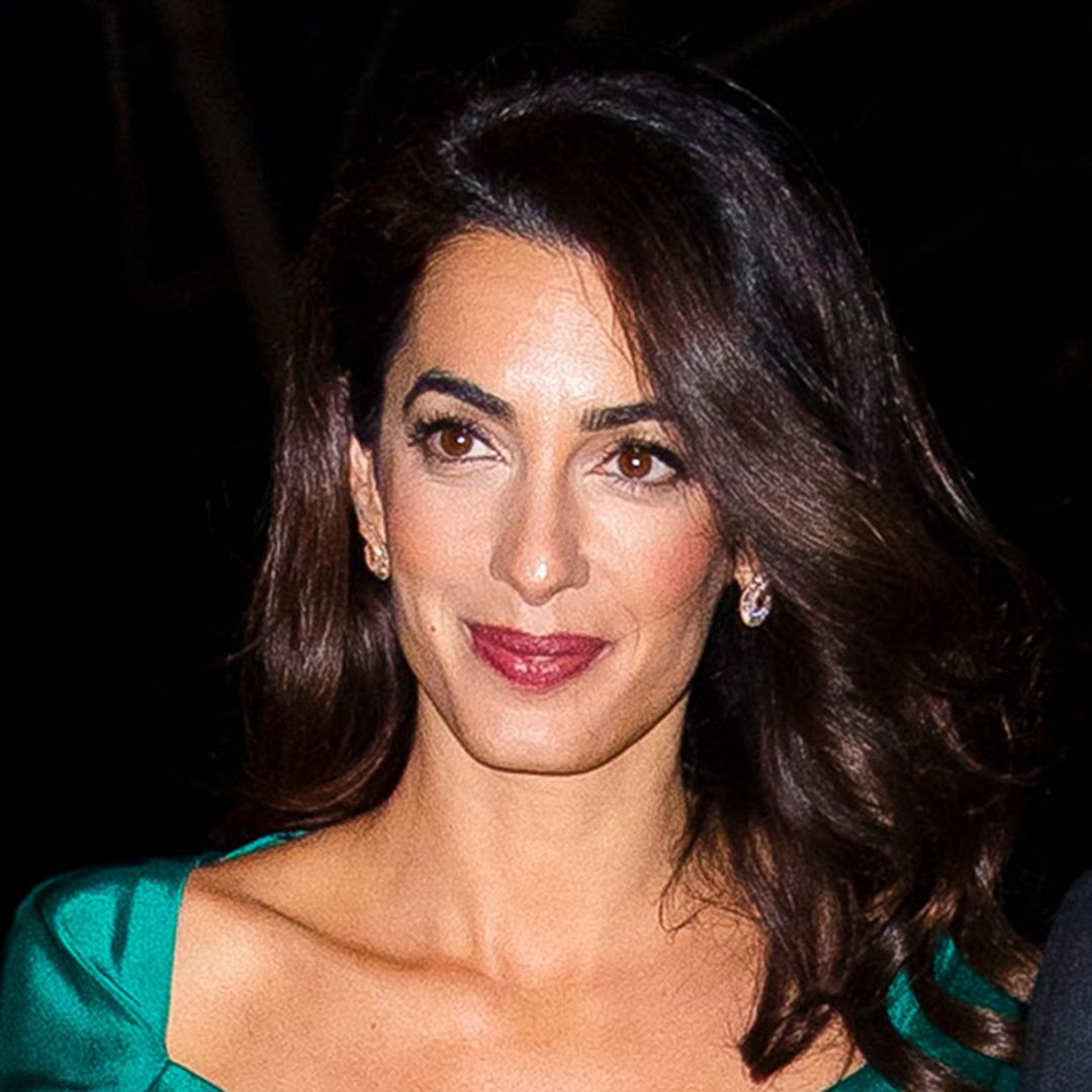 Amal Clooney dazzles in green silk ensemble for New York outing with husband George