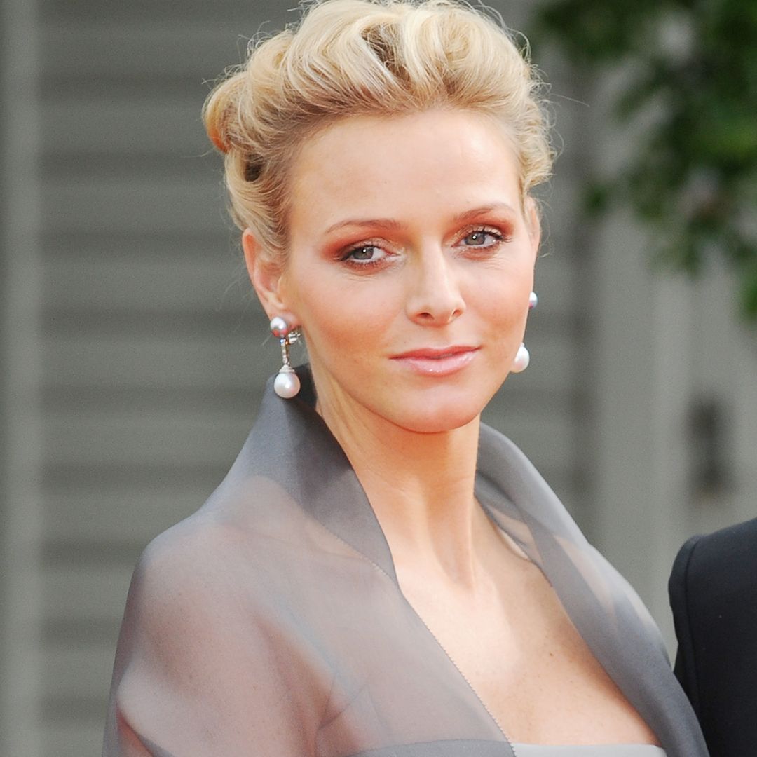 Newly-engaged Princess Charlene rocks slinky satin wedding guest dress in unearthed photo