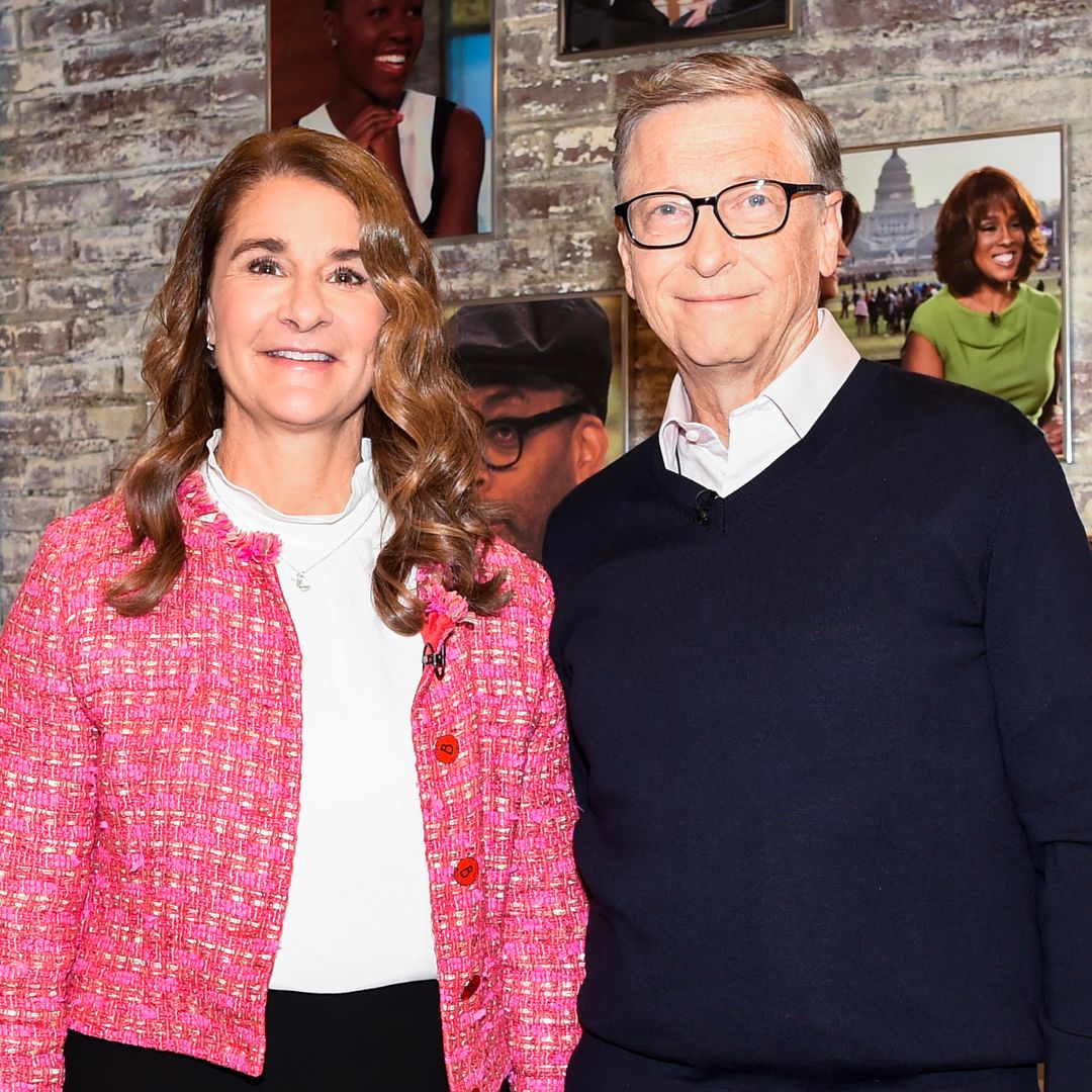 Bill and Melinda Gates smiling for a photo in a TV studio