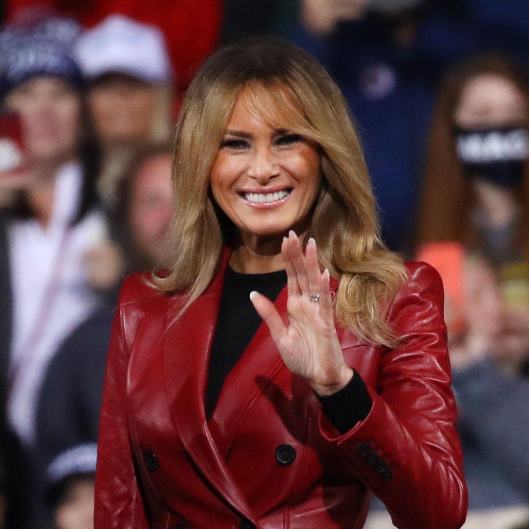 Melania Trump is radiant in red as she makes rare public appearance to support husband Donald Trump