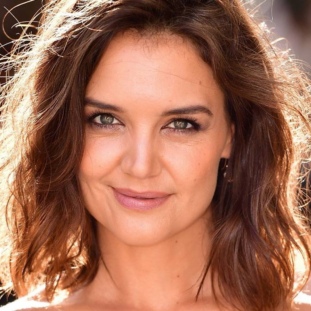 Katie Holmes shares stunning beach photo wearing strappy black swimsuit - and fans react
