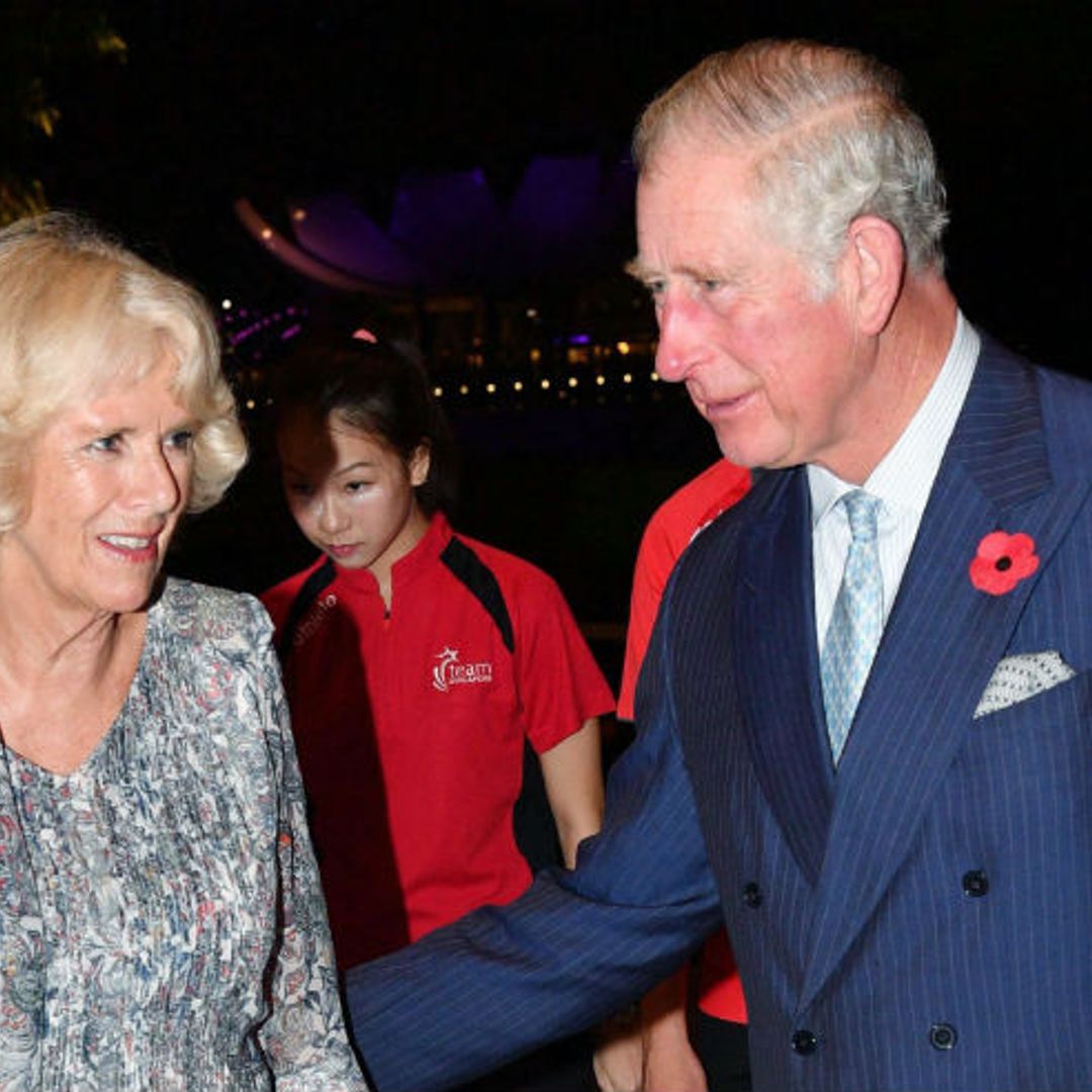 Prince Charles and the Duchess of Cornwall kiss in rare show of affection 