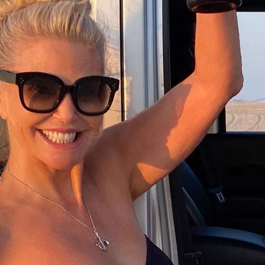 Christie Brinkley looks phenomenal in strapless swimsuit in gorgeous beachside photo