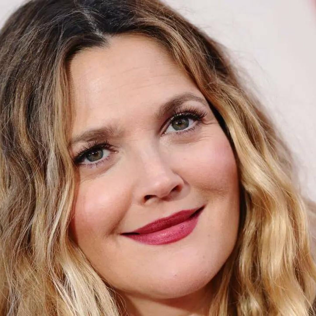 Drew Barrymore causes a stir in white silk dress in epic throwback photo
