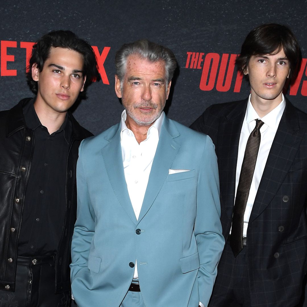 Pierce Brosnan's lookalike sons support famous father in rare public outing – see photos