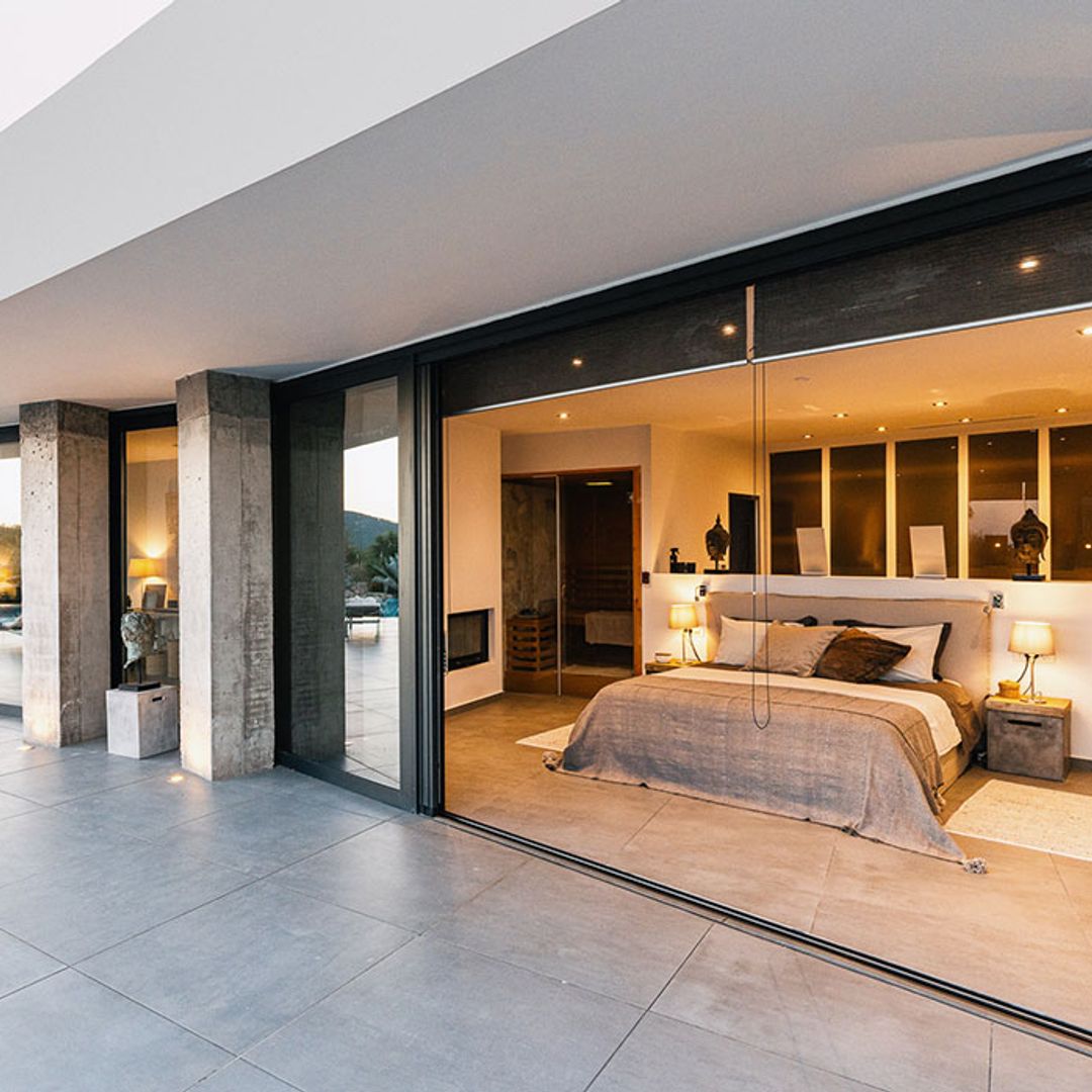 bedroom in villa in greece leading out to patio