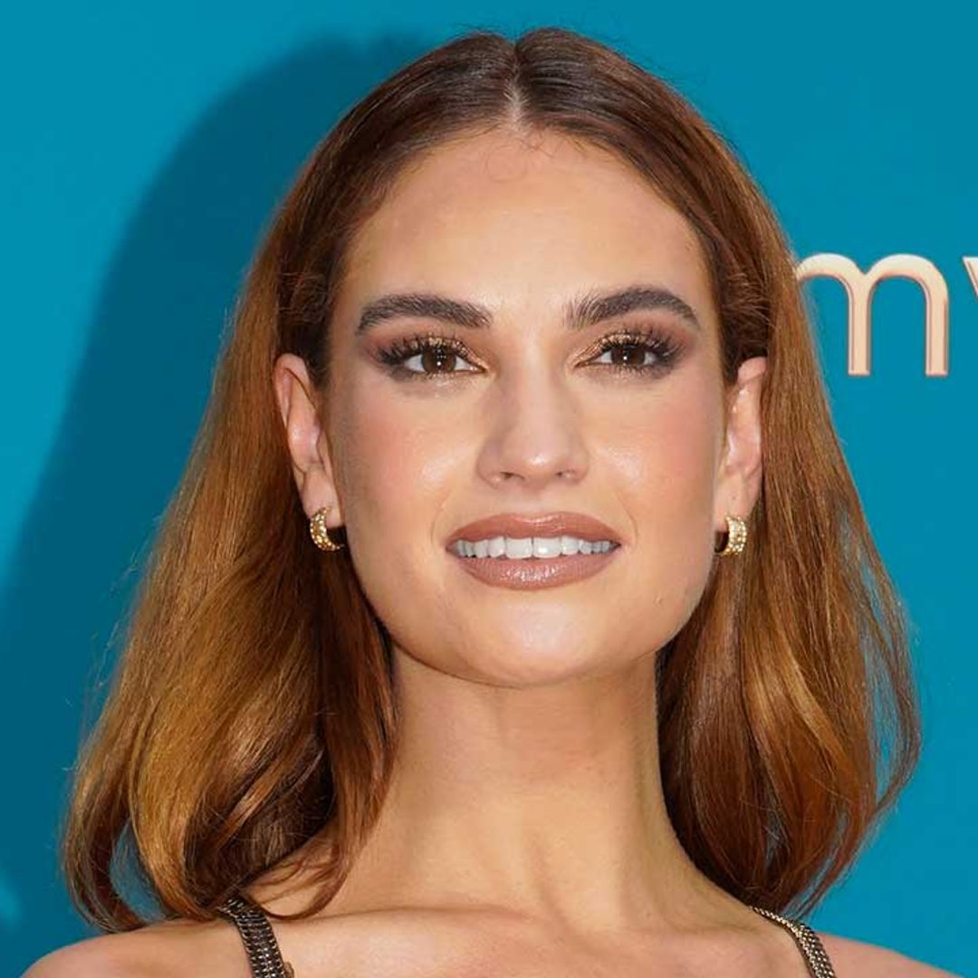 Lily James serves up jungle-glamour in linen shirt and hiking boots