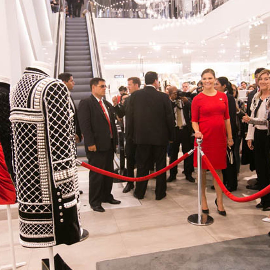 Crown Princess Victoria of Sweden views the Balmain for H&M collection