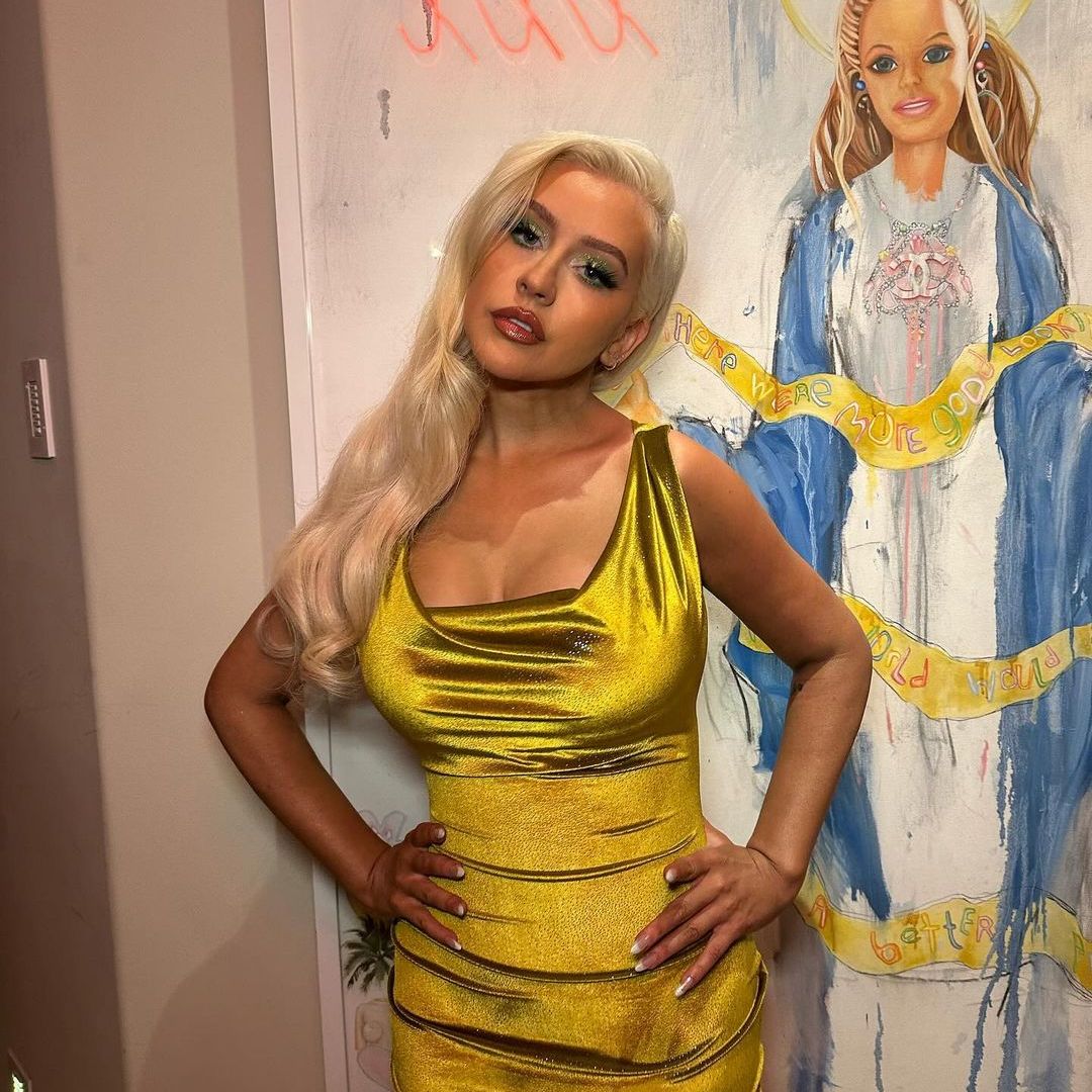 Christina Aguilera shares iconic topless photo as she revisits dramatic change to appearance