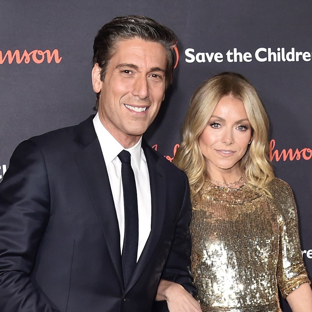 David Muir is sun-kissed with tousled hair in vacation photos with Kelly Ripa as he turns 50 – see his reaction
