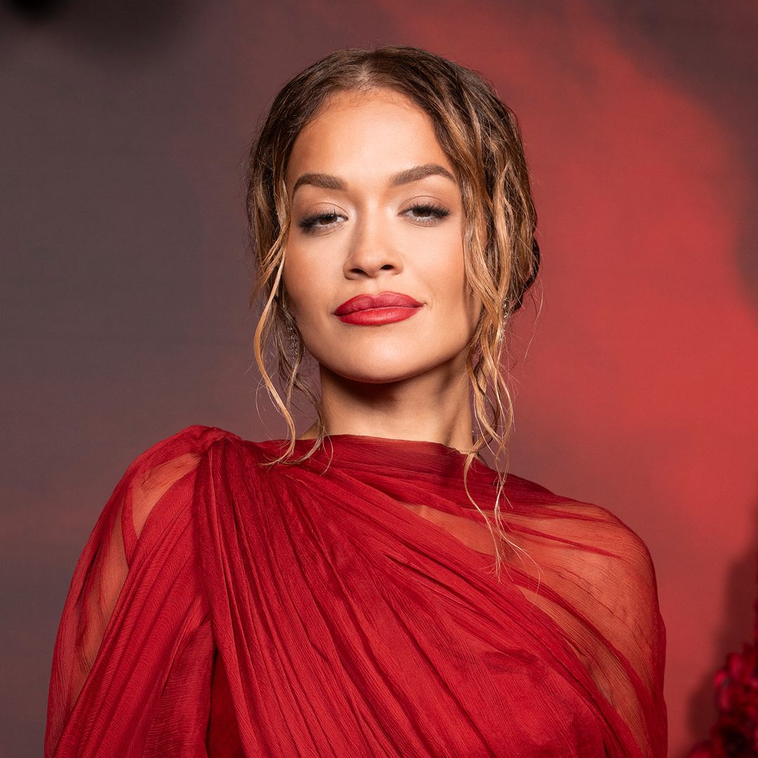 Rita Ora's racy red lace crop top and low-rise midi skirt combo is a heatwave dressing dream