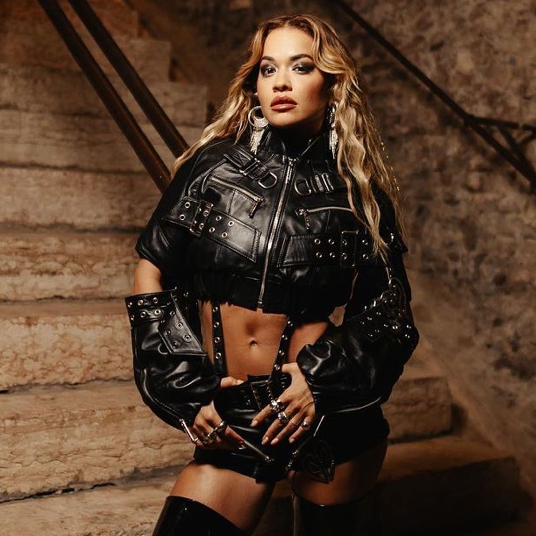 Rita Ora’s leather micro shorts and knee high boots reminded us of an iconic 90s fashion moment