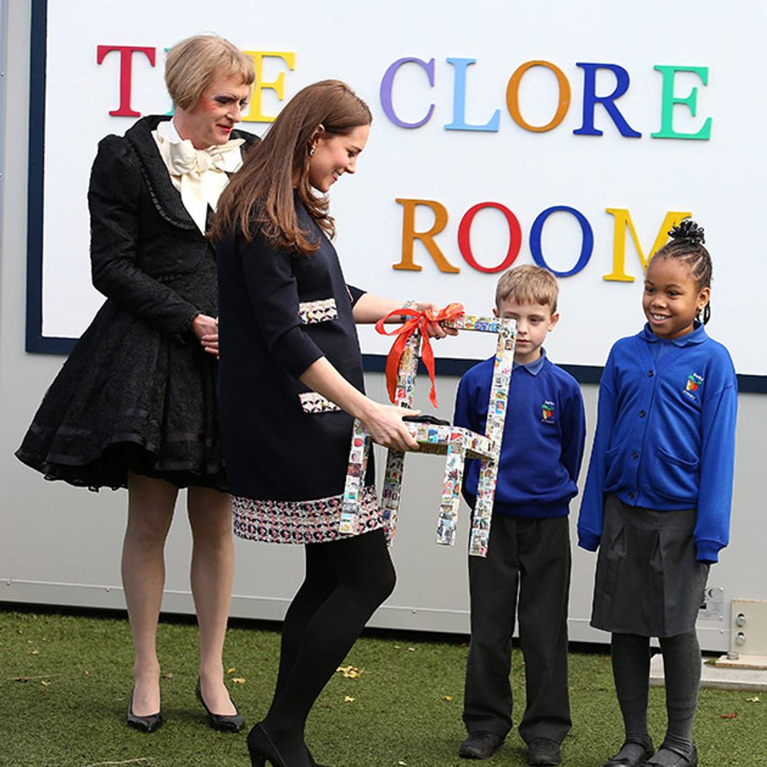 Duchess Kate displays her prominent bump at London primary school