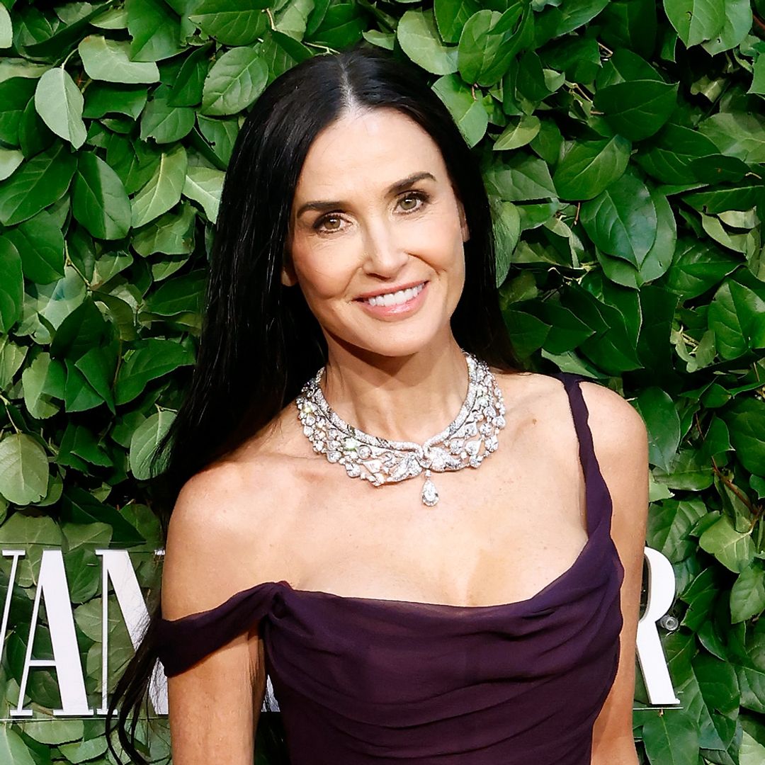 Demi Moore's Christmas tree is so tall that she needs a ladder - see photo