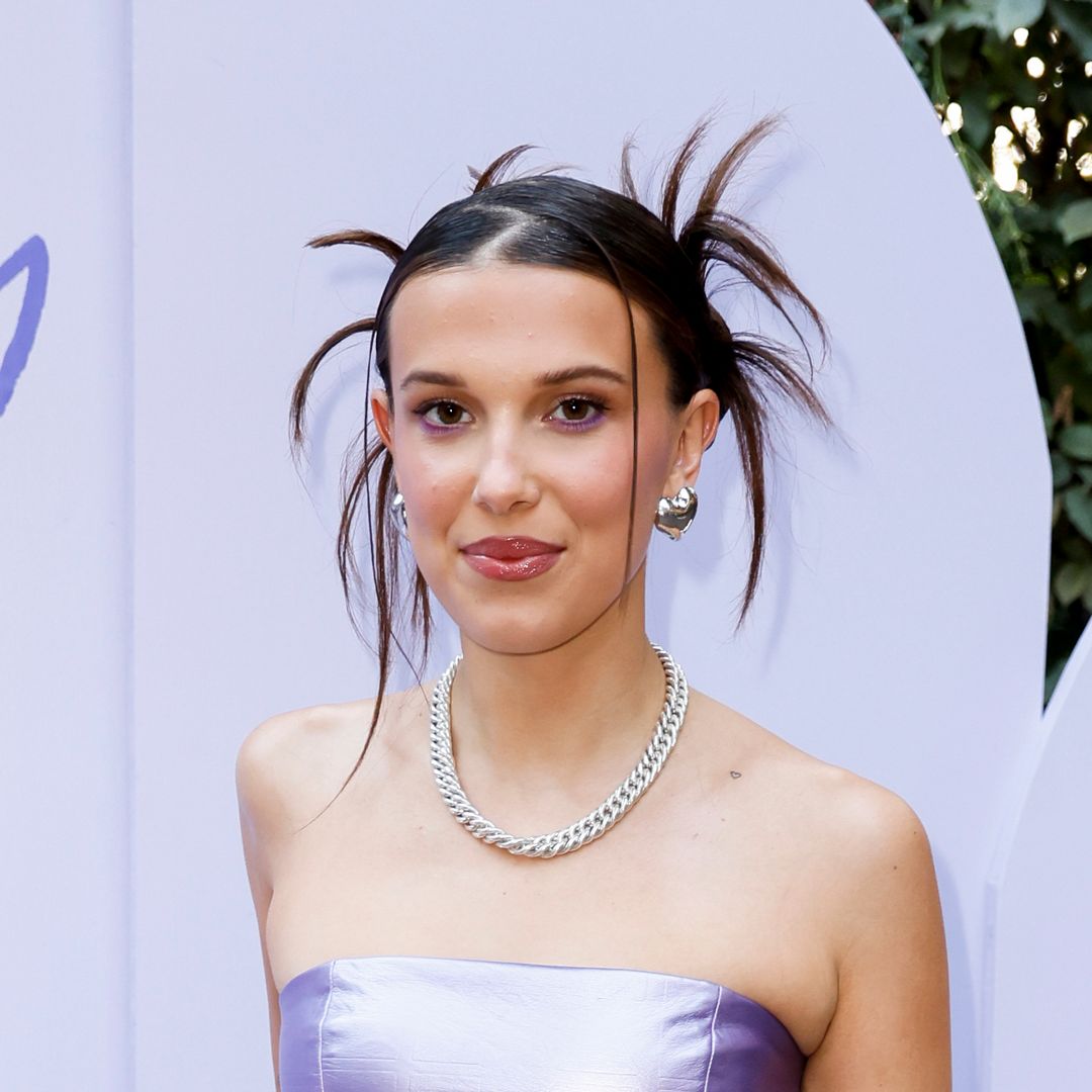 Millie Bobby Brown shares new behind-the-scenes look at her fragrance shoot and her dress is incredible