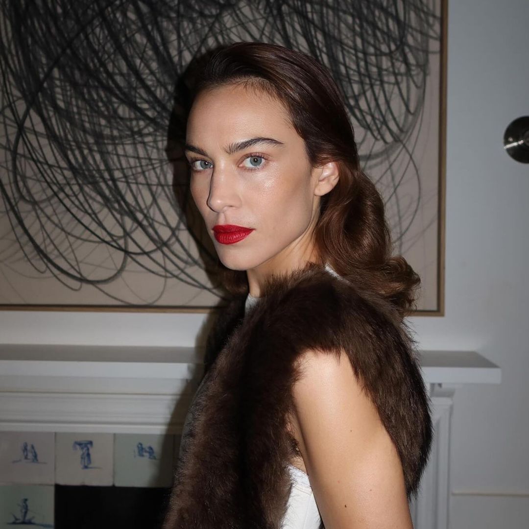 Alexa Chung's sheer tights and silk pyjama combo is peak It-Girl