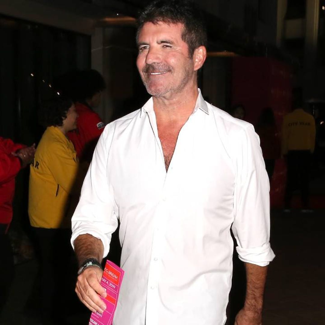 Simon Cowell pictured walking with son Eric following bike accident – details