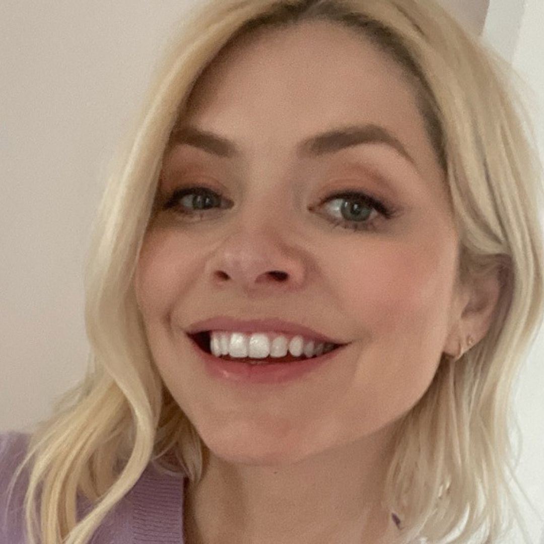 Holly Willoughby films from princess bed inside private family home
