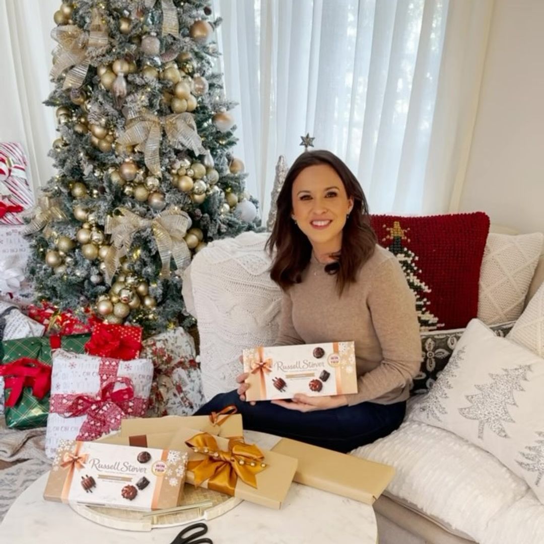 Lacey Chabert poses for a promotional photograph in her home during Christmas time, shared on Instagram