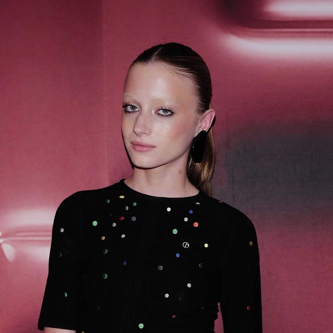 Naomi Watts' daughter Kai is all smiles as she holds hands with friend in NYC