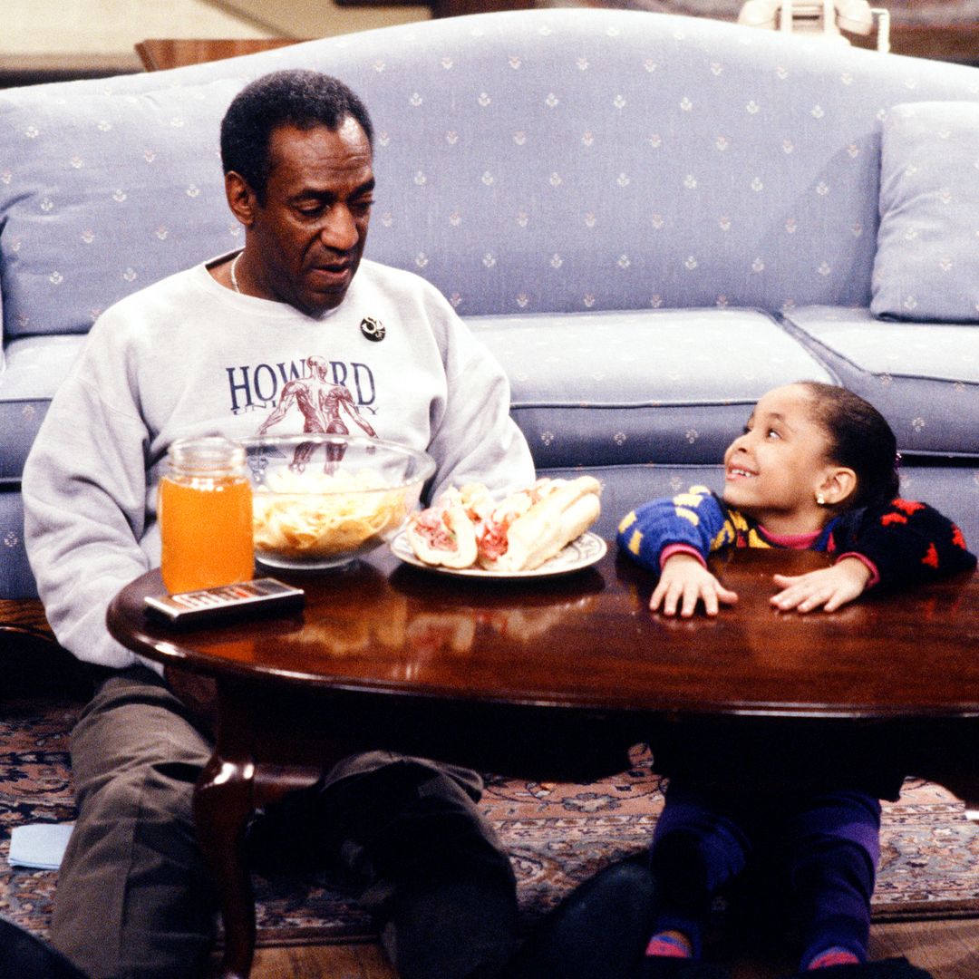 THE COSBY SHOW -- "It's Your Move" Episode 13 -- Pictured: (l-r) Bill Cosby as Dr Heathcliff Huxtable and Raven Symone as Olivia Kendall