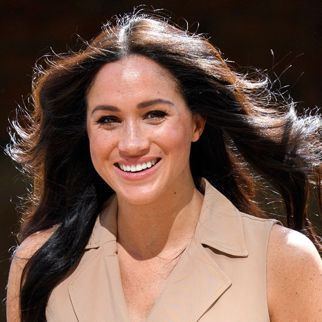 The Duchess of Sussex smiles in never-before-seen photo with private chef from royal tour