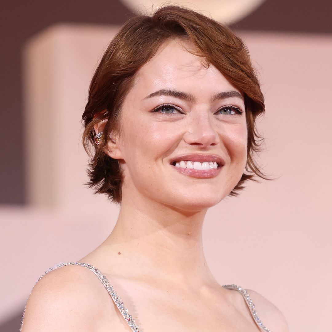 Emma Stone glittery gown and copper pixie cut